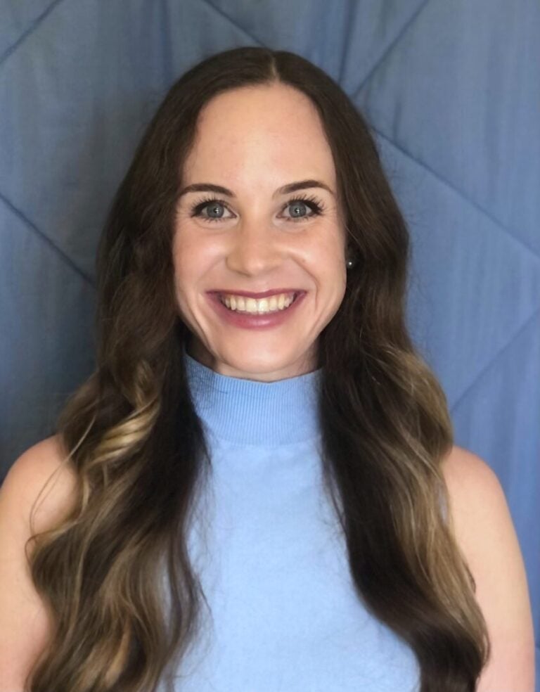 Headshot of Corrie McDulin, MFT (Ohio), Therapist